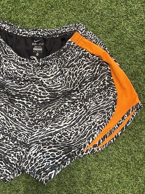 Nike Black & White Animal Print Shorts with Orange Side Panels